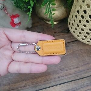 Coach Orange Leather Hang Tag Bag Charm Pendant
